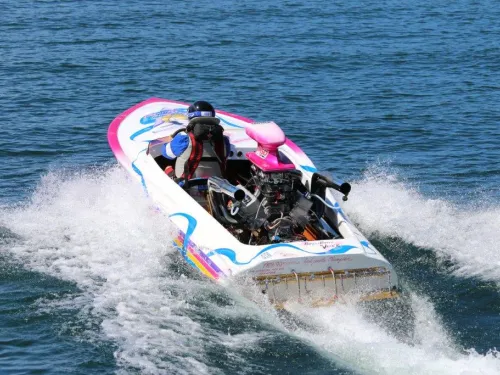 A speed boat on Sproat Lake